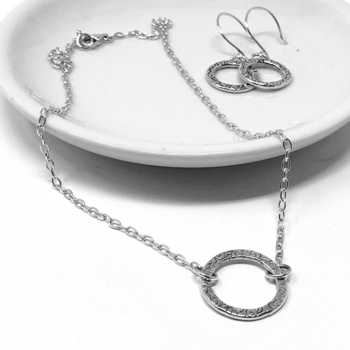 Silver necklace and earrings