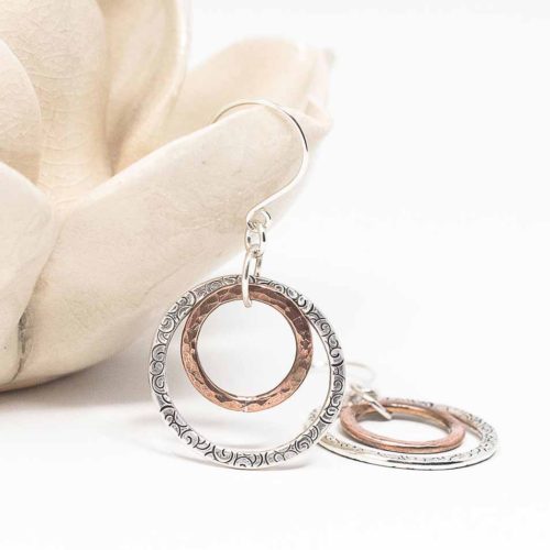 Hoops in sterling silver and copper on silver ear wire