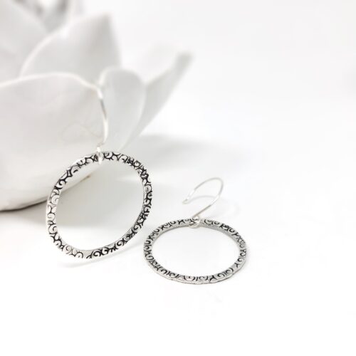 Sterling silver hoop earrings. Connection collection.