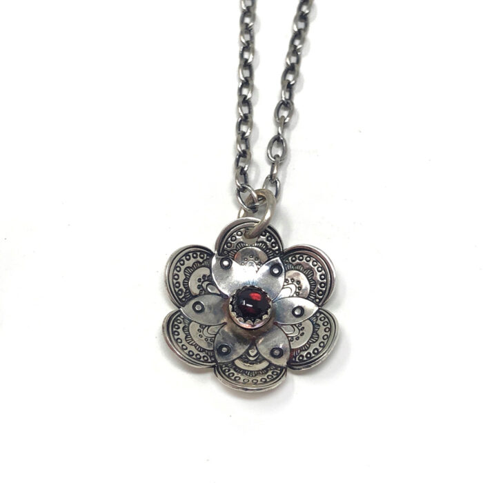 Flower collection, necklace, stamped silver and garnet gemstone