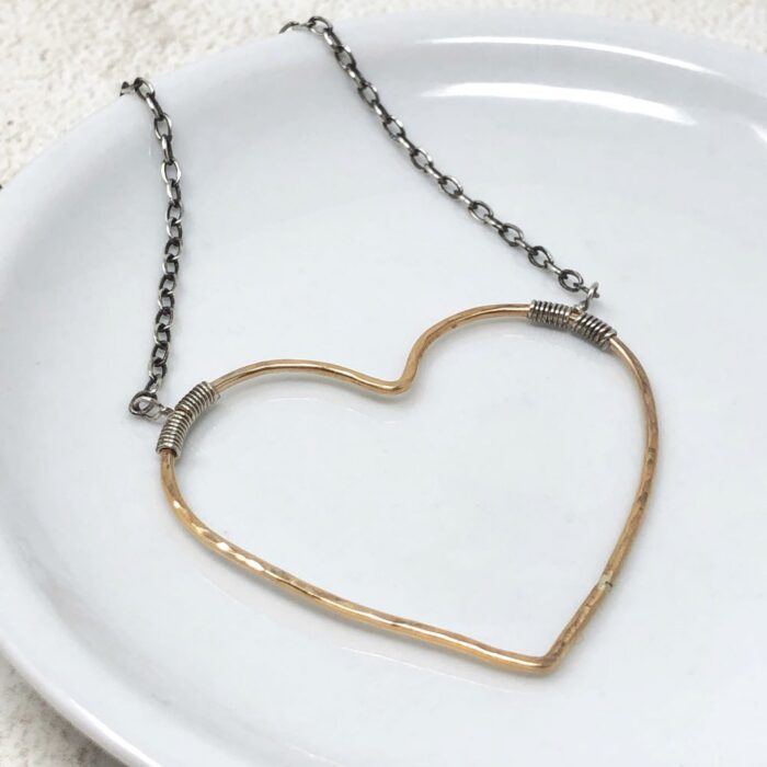 Big heart necklace in gold and silver