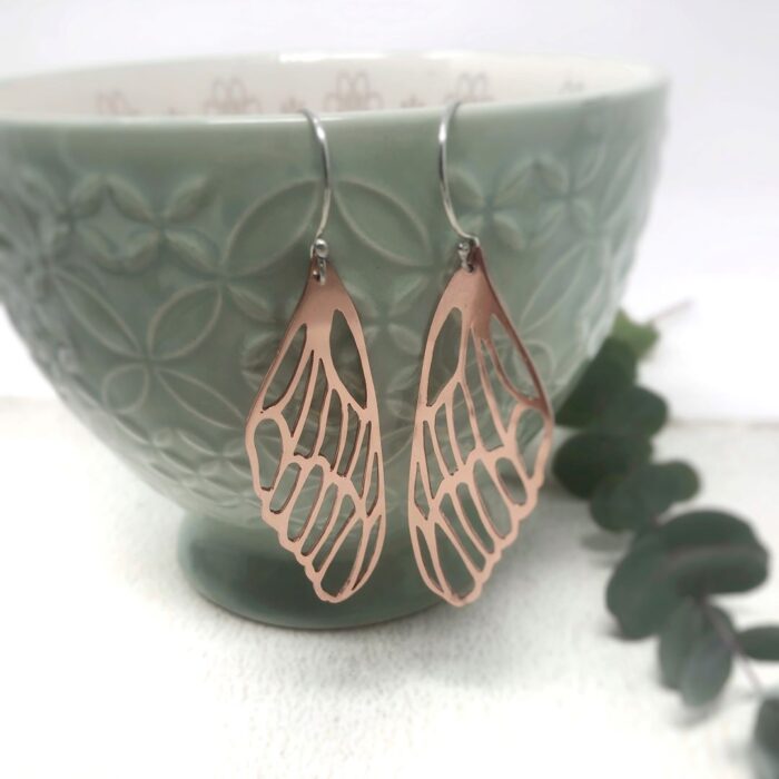 Butterfly wing earrings in copper